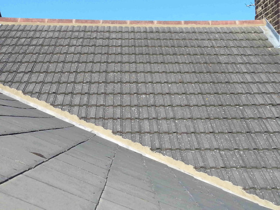 K.W.S. re-laid ridge tiles lead valley mortar