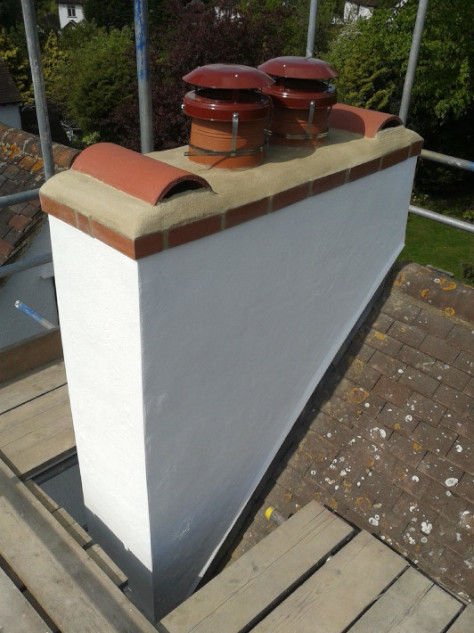 K.W.S. chimney renovations capped flue painted stack