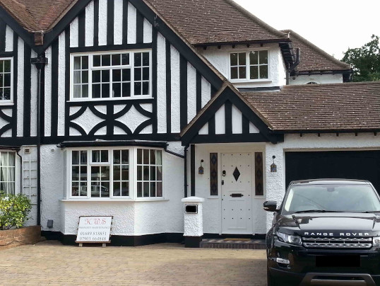 K.W.S. house renovations  painted tudor style brilliant white finish