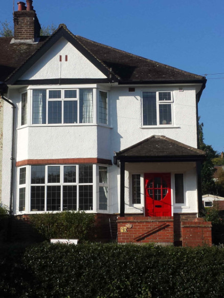 K.W.S. house renovations purley painted pebble dash rough cast brilliant white finish